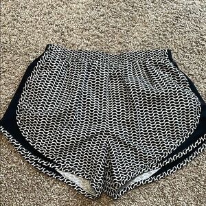 Nike Black and White Athletic Shorts with Curved Hem